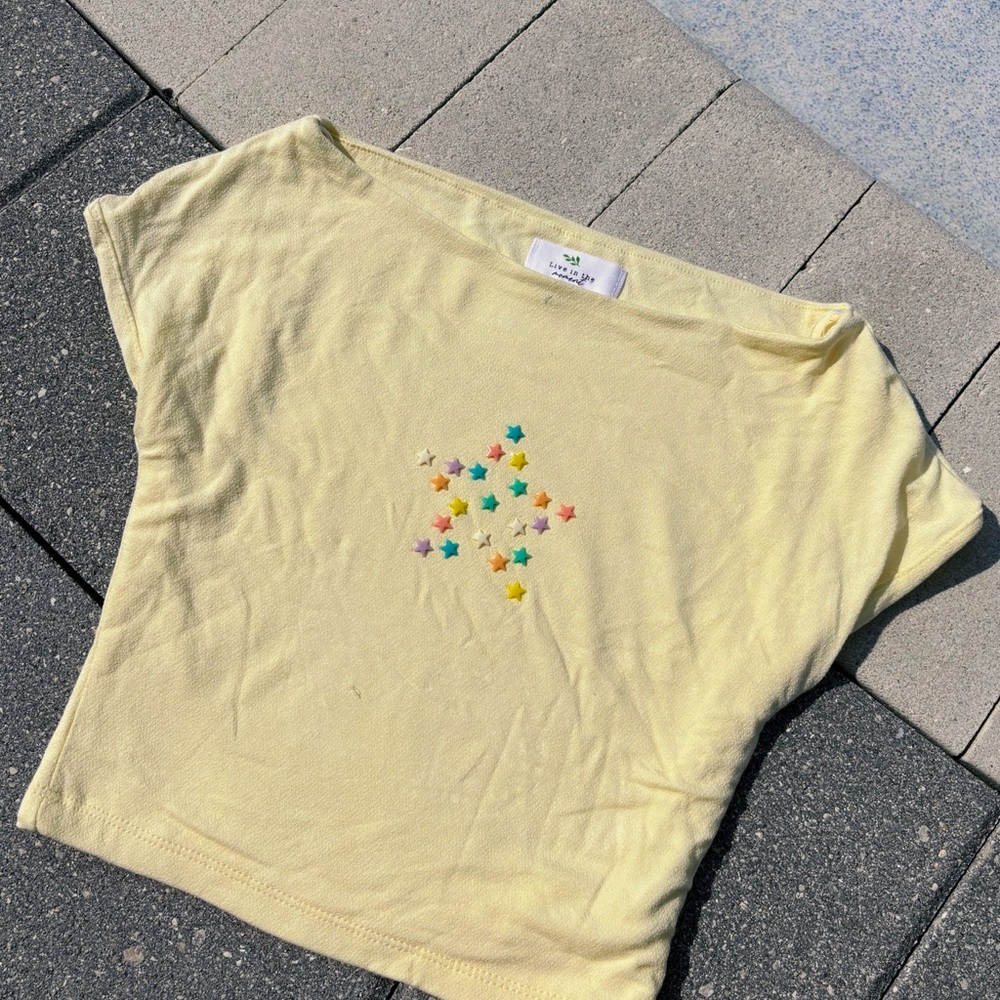 Yellow Tee with Colorful Star Design